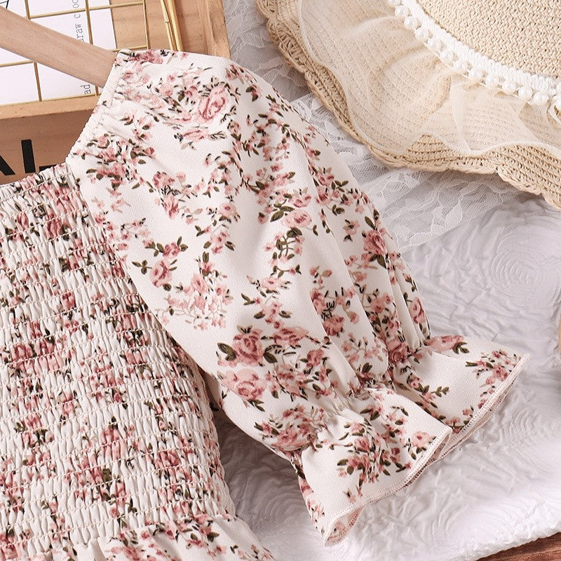 Girl's Dress With Elasticized Ruffles And Printed Flowers