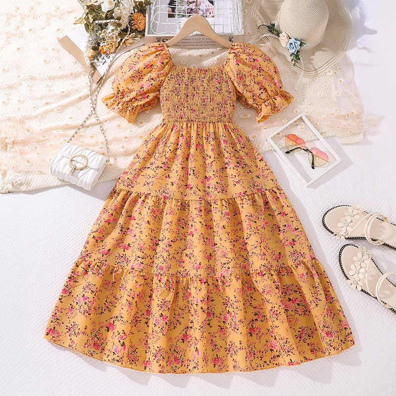 Girl's Dress With Elasticized Ruffles And Printed Flowers