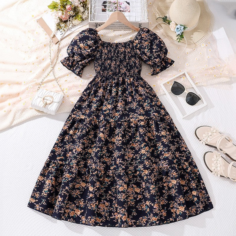 Girl's Dress With Elasticized Ruffles And Printed Flowers