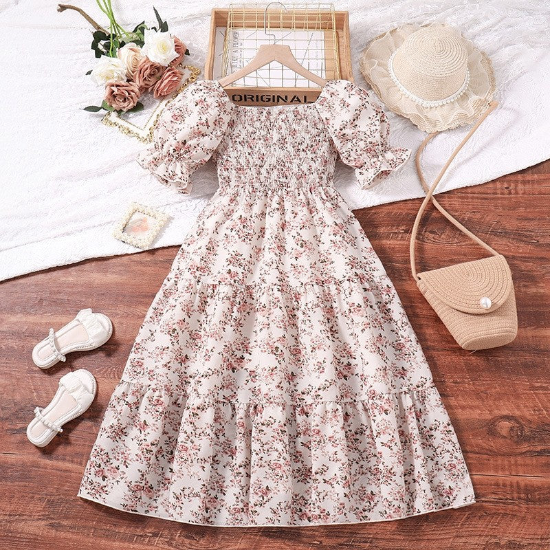 Girl's Dress With Elasticized Ruffles And Printed Flowers