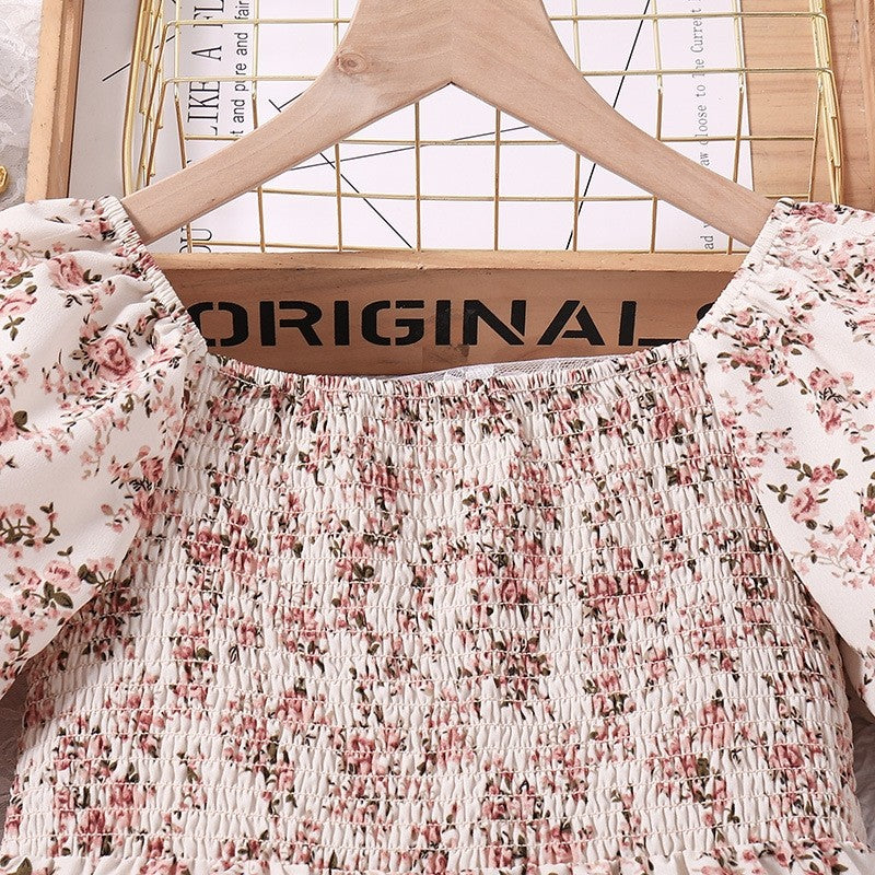 Girl's Dress With Elasticized Ruffles And Printed Flowers
