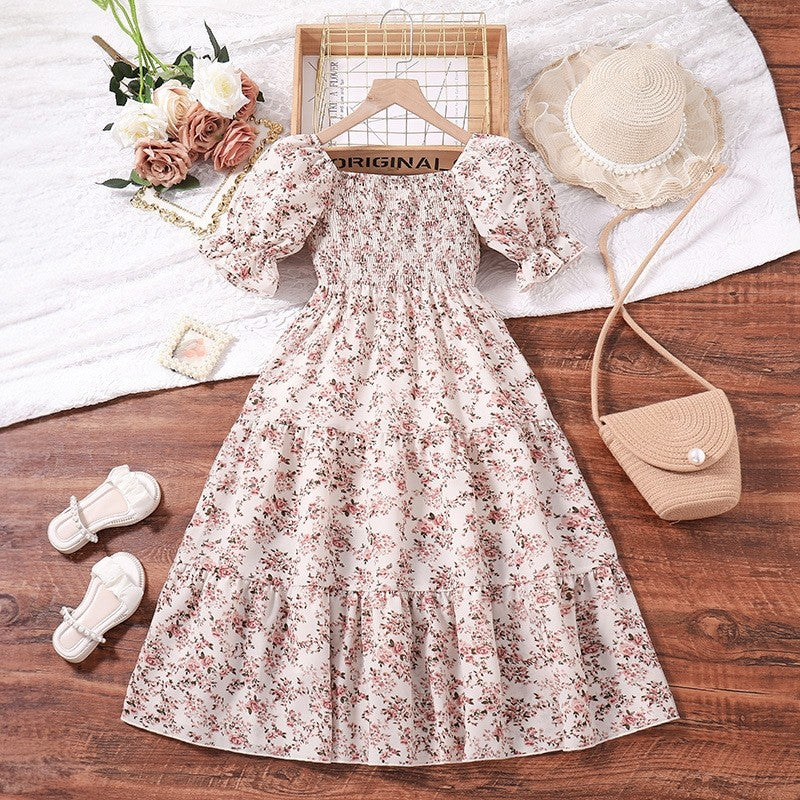 Girl's Dress With Elasticized Ruffles And Printed Flowers